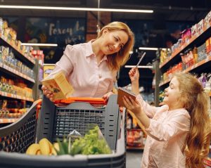 mother and daughter grocery shopping
